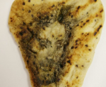 Heavens above.. The face of Jesus appeared in a naan served at India Dining in Esher.jpg
